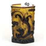 An unusual Chinese two colour Peking carved cameo glass hexagonal brush pot decorated with