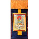 A Tibetan silk mounted thangka of the green Tara, 124 x 82cm.