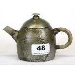 A Chinese pewter decorated terracotta teapot with jade spout and handle, H. 9.5cm.