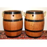 A pair of oak barrels, H. 38cm.