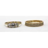 Two 9ct yellow gold stone set rings, (L & L.5).