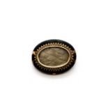 A rose metal (tested minimum 9ct gold) mounted jet mourning brooch, 4 x 3.2cm.