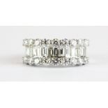 An 18ct white gold (stamped 750) ring set with brilliant and baguette cut diamonds, approx. 2.