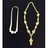 Two 19th Century ivory necklaces.