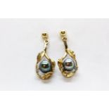 A pair of 9ct yellow gold black pearl and diamond set drop earrings, L. 2.6cm.