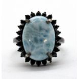 A 925 silver large cluster ring set with cabochon cut larimar and black spinel, 2.1 x 1.7cm, (S).