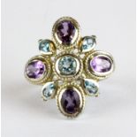 A 925 silver ring set with blue topaz and amethysts, (P).