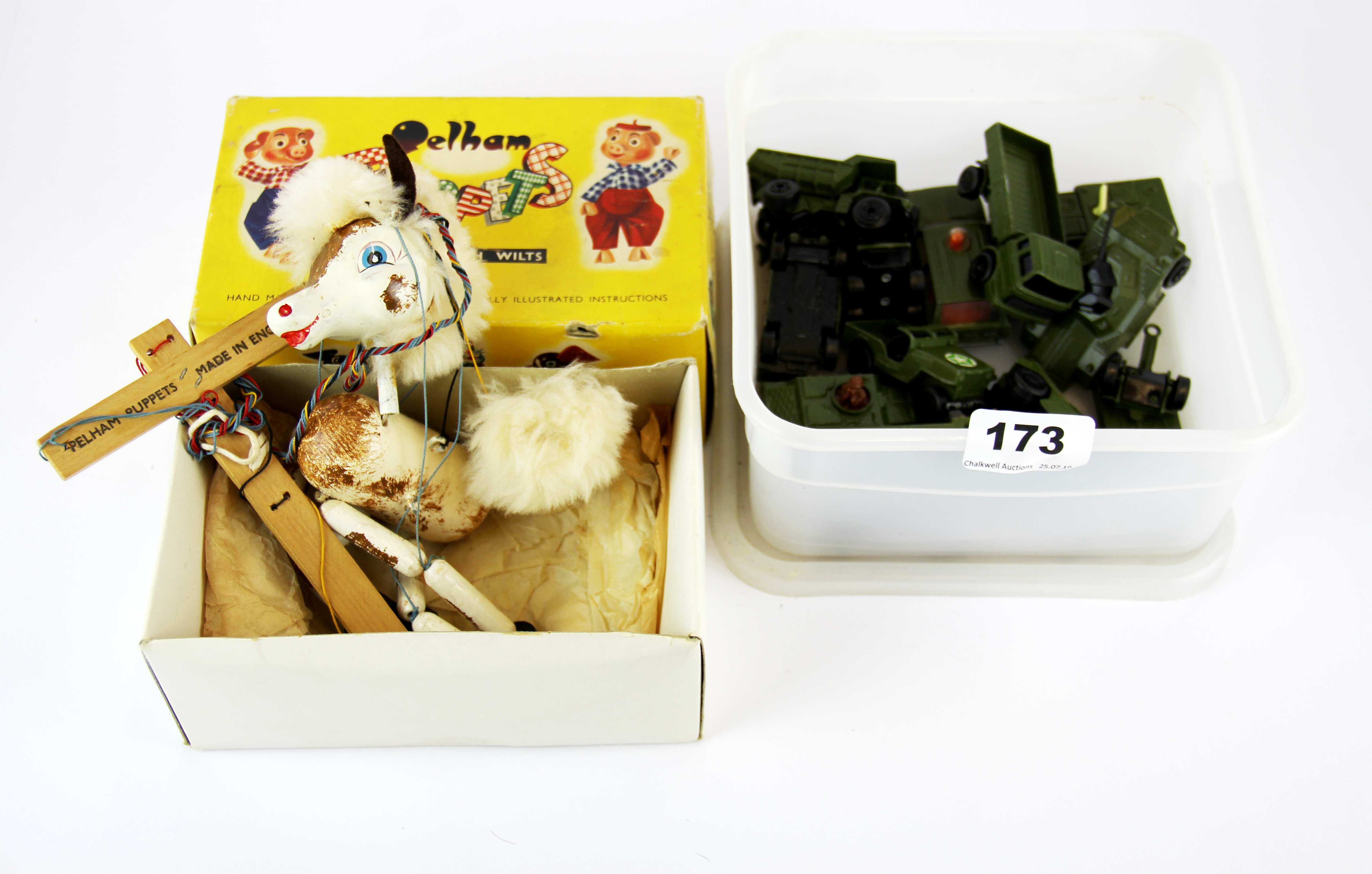 A quantity of Matchbox diecast military vehicles and a Pelham puppet.