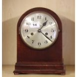 A 1920's mahogany striking mantle clock, H. 28cm.