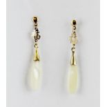 A pair of yellow metal (tested minimum 9ct gold) mother of pearl set drop earrings, L. 4.5cm.