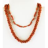 Two antique coral bead necklaces.