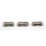 Three 925 silver stacking rings set with ruby, sapphire and emeralds, (O).