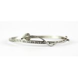 A 925 silver stone set bangle, L. 5.5cm.