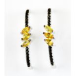 A pair of 925 silver earrings set with marquise cut orange sapphires and black spinels, L. 2.5cm.