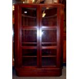 A 1980's Danish hardwood veneered corner drinks cabinet, W. 92 H. 137cm.