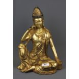 A Tibetan gilt bronze Buddha figure, H. 33cm.