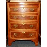 A burr veneered bow fronted small chest of drawers with a top extending tray, 75 x 53 x 43cm.