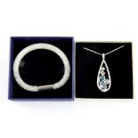 A boxed Swarovski 'Stardust' bracelet and a boxed Jon Richard pendant and chain set with Swarovski