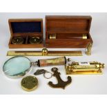 A desk calendar, magnifying glass, ruler and other instruments.