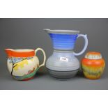 A Clarice Cliff 'Bizarre' pattern jug, a Shelley pottery jug and a further unmarked Shelley ginger