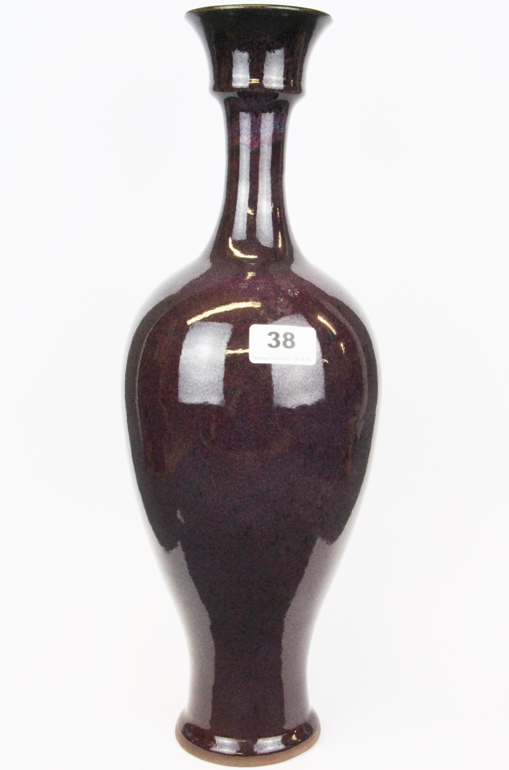 A Chinese Zhun glazed pottery vase, H. 44cm.