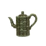 A Chinese green clay Yixing terracotta teapot, H. 17cm.