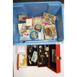 A large box of costume jewellery and watches, including some silver.