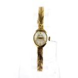 A boxed Accurist lady's 9ct gold wrist watch.