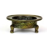 An early 20th Century Chinese bronze censer, Dia. 16cm, H. 7cm.