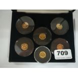 A group of six House of Windsor 9ct gold limited edition coins.