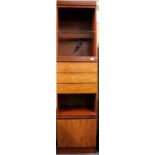 A tall hardwood 1970's storage unit, H. 196cm.