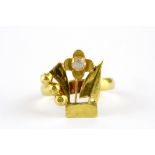 A yellow metal (tested 22ct gold) stone set ring, (L).