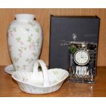 A boxed Waterford crystal clock and three Wedgwood 'Rose hip pattern ornaments' tallest H. 11cm.