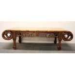 A Chinese carved hardwood coffee table, H. 34cm L. 110cm.