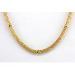 An 18ct yellow gold (stamped 750) necklace, L. 40cm.