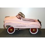A Gearbox metal toy pedal car 1950's pink saloon, L. 95cm.