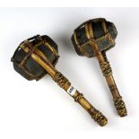 Antiquities interest. Two Stone age hammer heads / clubs, re-mounted with cane handles, L. 35cm.