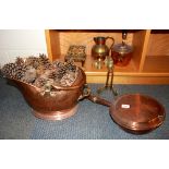 A copper kettle, a bed warmer, a coal scuttle and other brass items.