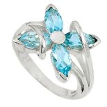 A 925 silver flower shaped ring set with marquise cut Swiss blue topaz, (R).