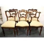 Two sets of three early 19th century carved hardwood dining chairs, all with matching upholstery.