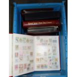 A large quantity of first day covers and stamp albums.