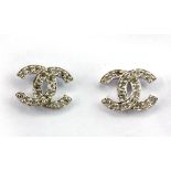A pair of 9ct white gold diamond set Chanel style earrings, L. 1.5cm.