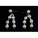 A pair of 9ct yellow gold pearl set drop earrings, L. 3.7cm.