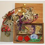 A small box of costume jewellery.