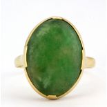 An 18ct yellow gold (stamped 18k) jade set ring, (N.5).