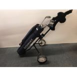 A Donnay children's golf bag containing eight golf clubs Pro one 0 putter, Pro One 1 putter, a 5,