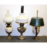 Two vintage oil lamps and a desk lamp, tallest H. 64cm.