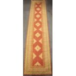 A Kasbah motif decorated runner, size 290 x 63cm.