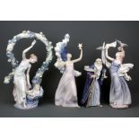 Four Lladro 'Millennium Figures' c. 2000 together with boxes, tallest H. 41cm.