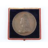 A cased Queen Victoria commemorative bronze medal, Dia. 7.5cm.